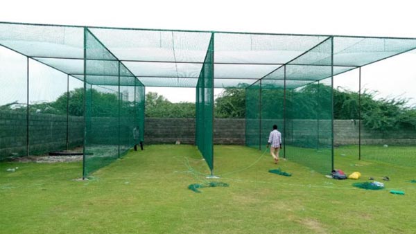 A durable cricket practice net set up for training.